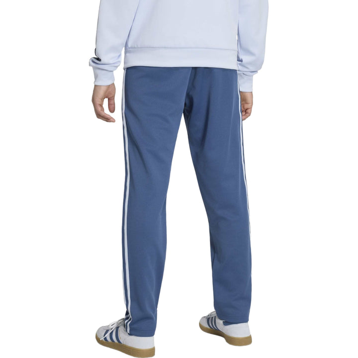 Men's blue polyester track pants with white side stripes