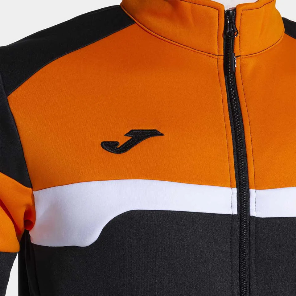 Close-up of the Joma Danubio III jacket chest area, showing the high-quality fabric texture, exposed zipper, and embroidered logo