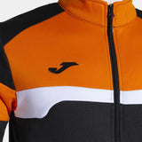 Close-up of the Joma Danubio III jacket chest area, showing the high-quality fabric texture, exposed zipper, and embroidered logo