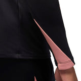 Close-up of the Jordan PSG black training top 2024 featuring stylish pink accents on sleeves