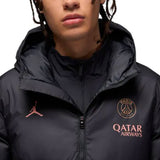 Jordan PSG UCL parka jacket featuring a sleek black design with logo details for soccer fans