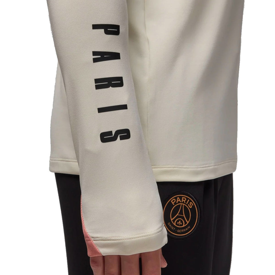 Jordan PSG UCL training top 2024 featuring Paris branding on the sleeve and logo on the hem