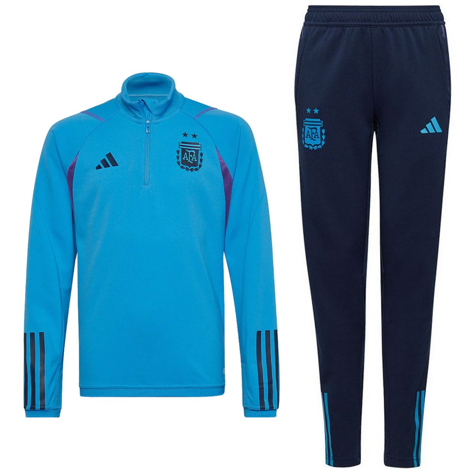 Kids Argentina soccer tracksuit 2022 featuring a blue long-sleeve top and navy pants with Adidas branding