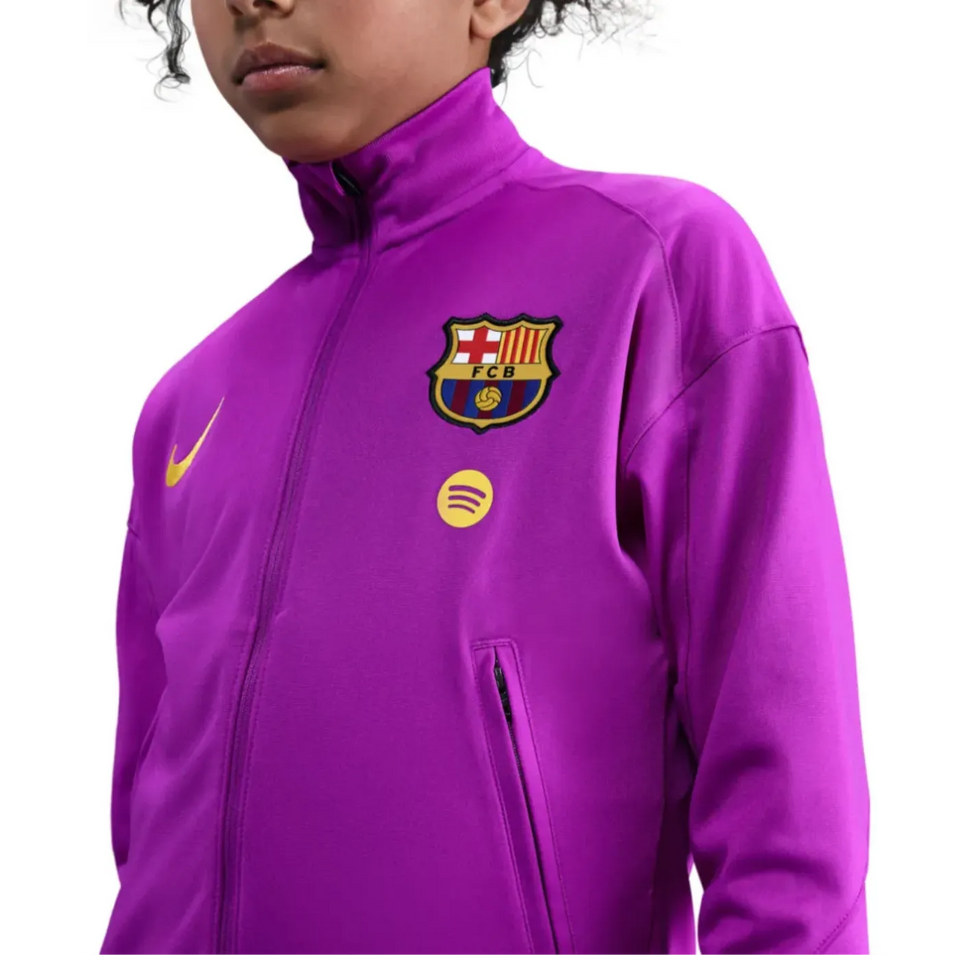 Kids FC Barcelona tracksuit 2025 26 in vibrant purple with Nike logo and club emblem