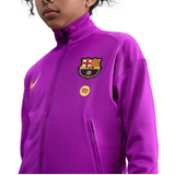 Kids FC Barcelona tracksuit 2025 26 in vibrant purple with Nike logo and club emblem