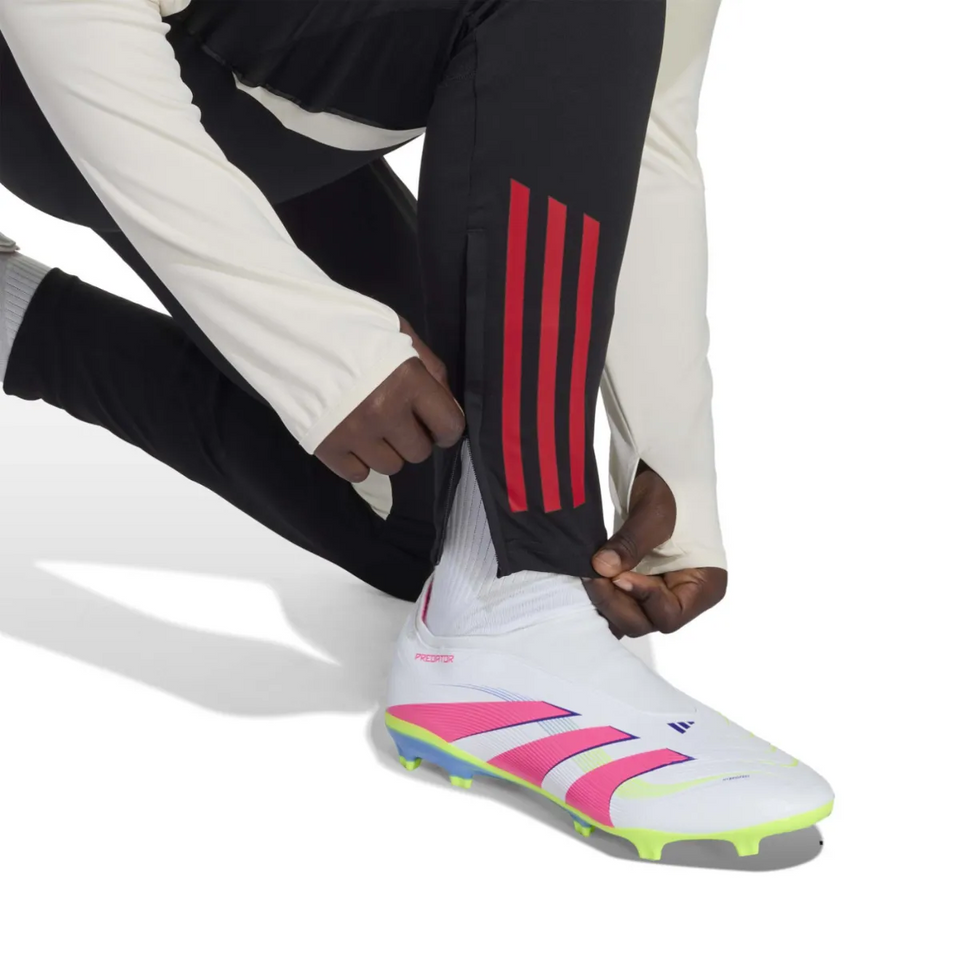 Kids Liverpool training tracksuit 2025 featuring black pants with red stripes and a stylish top