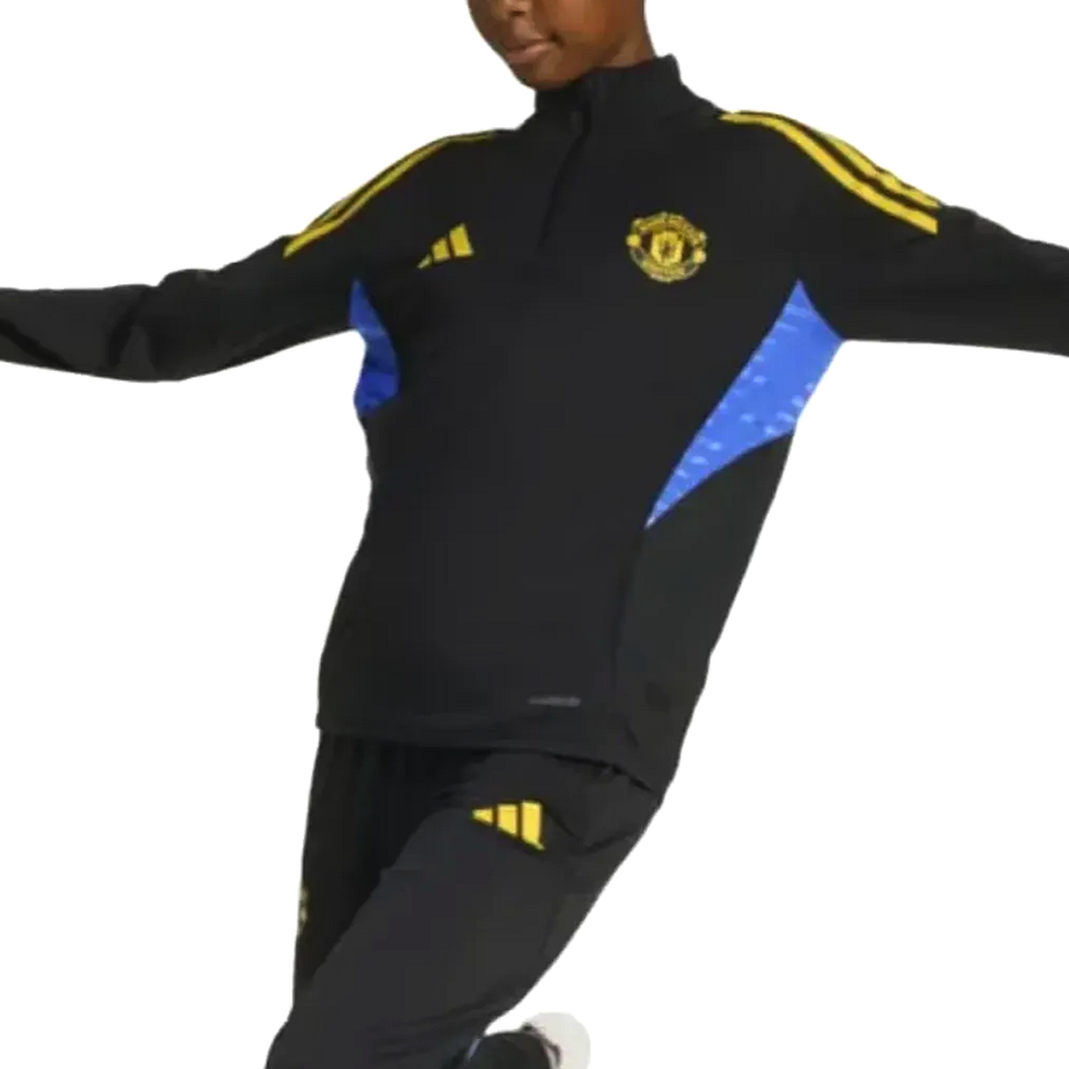Kids Manchester United UCL training tracksuit 2025 in black with yellow and blue accents