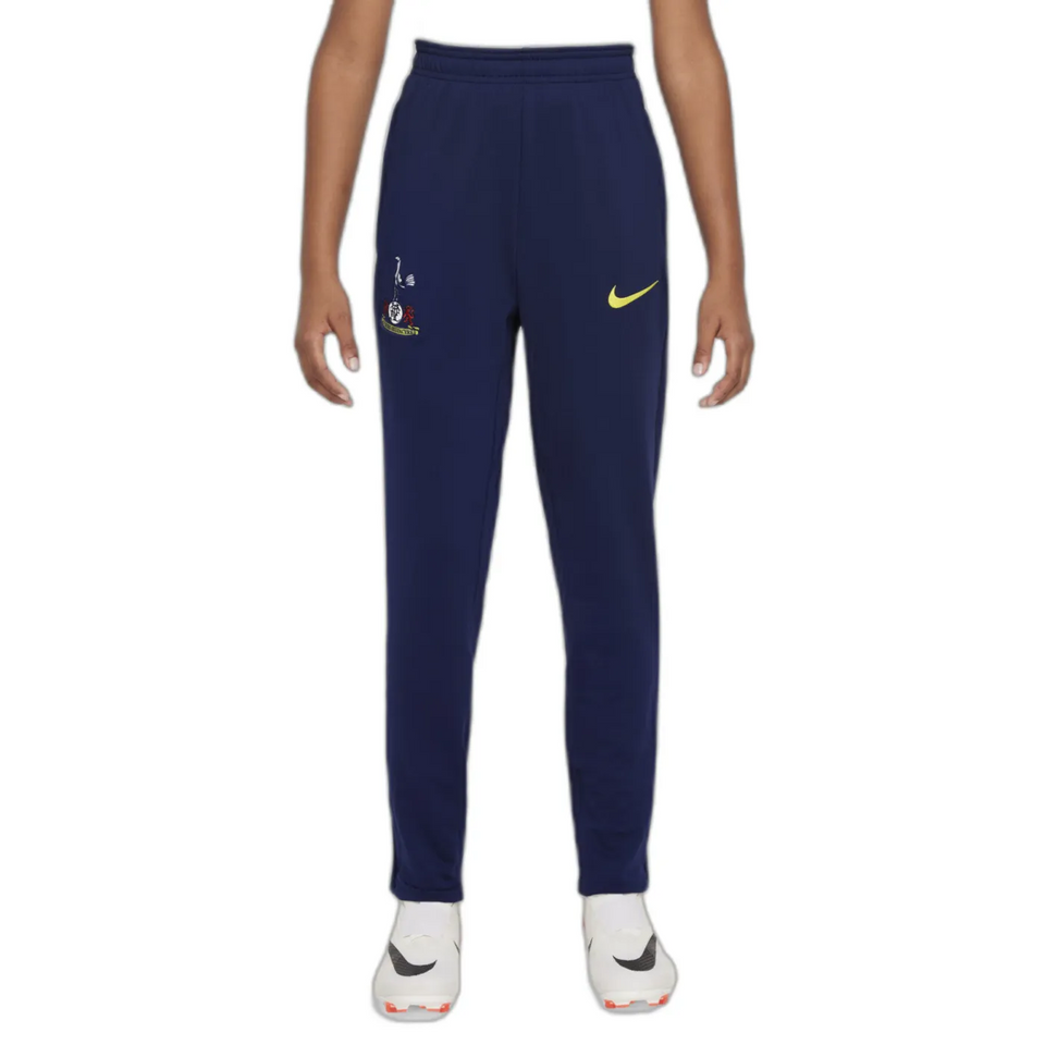 Kids Tottenham Hotspur UCL tracksuit 2025 featuring comfortable navy pants with Nike logo