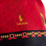Close-up of the Lacatoni Angola soccer jersey 2026 featuring vibrant red and black patterns