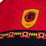 Lacatoni Angola soccer jersey 2026 featuring bold red and black design with federation logo