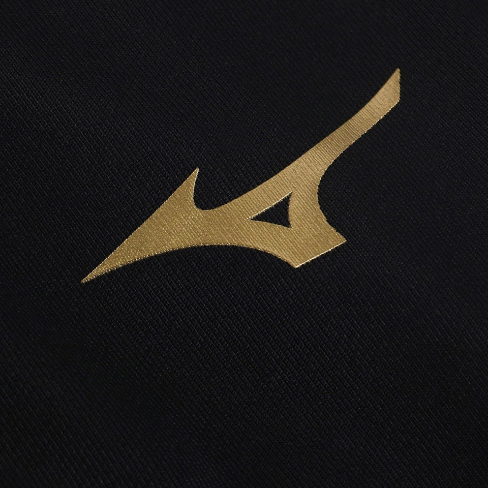 Close-up of the gold Mizuno logo on a Lazio Mizuno cotton tracksuit black fabric