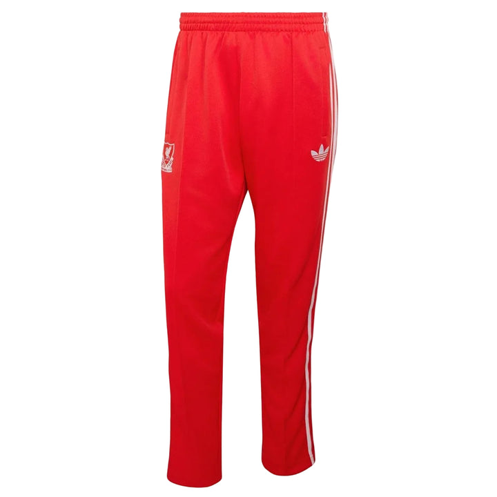 Red Adidas x Liverpool FC tracksuit pants with white stripes on a light gray background