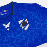 Close up of UC Sampdoria home jersey 2024 25 blue v neck shirt with embroidered club crest