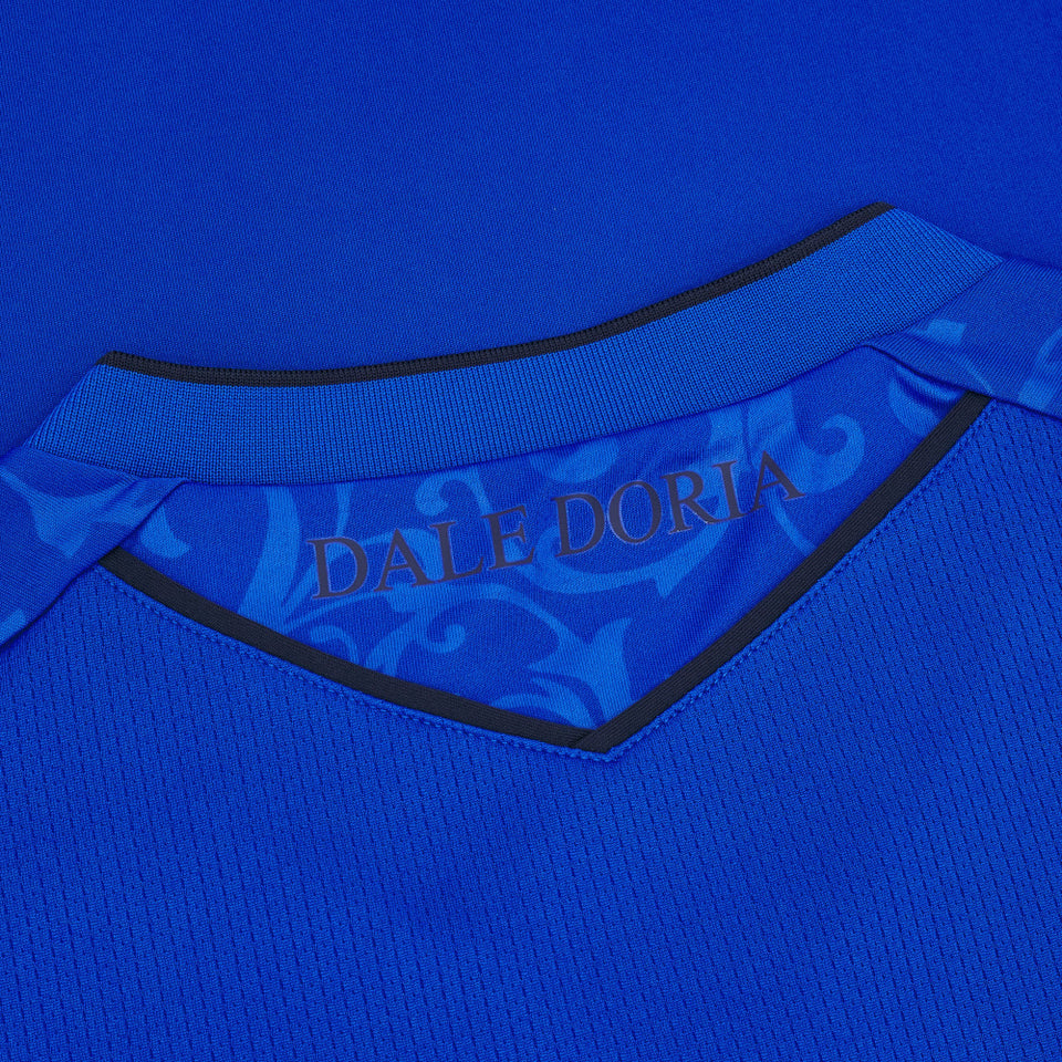 Close up of blue UC Sampdoria home jersey 2024 25 collar showing inner Dale Doria print and textured fabric