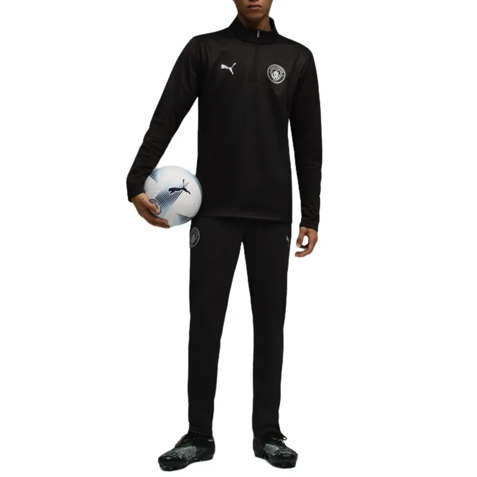 Manchester City black training tracksuit 2025, featuring a zip-up top and tapered pants for comfort and style