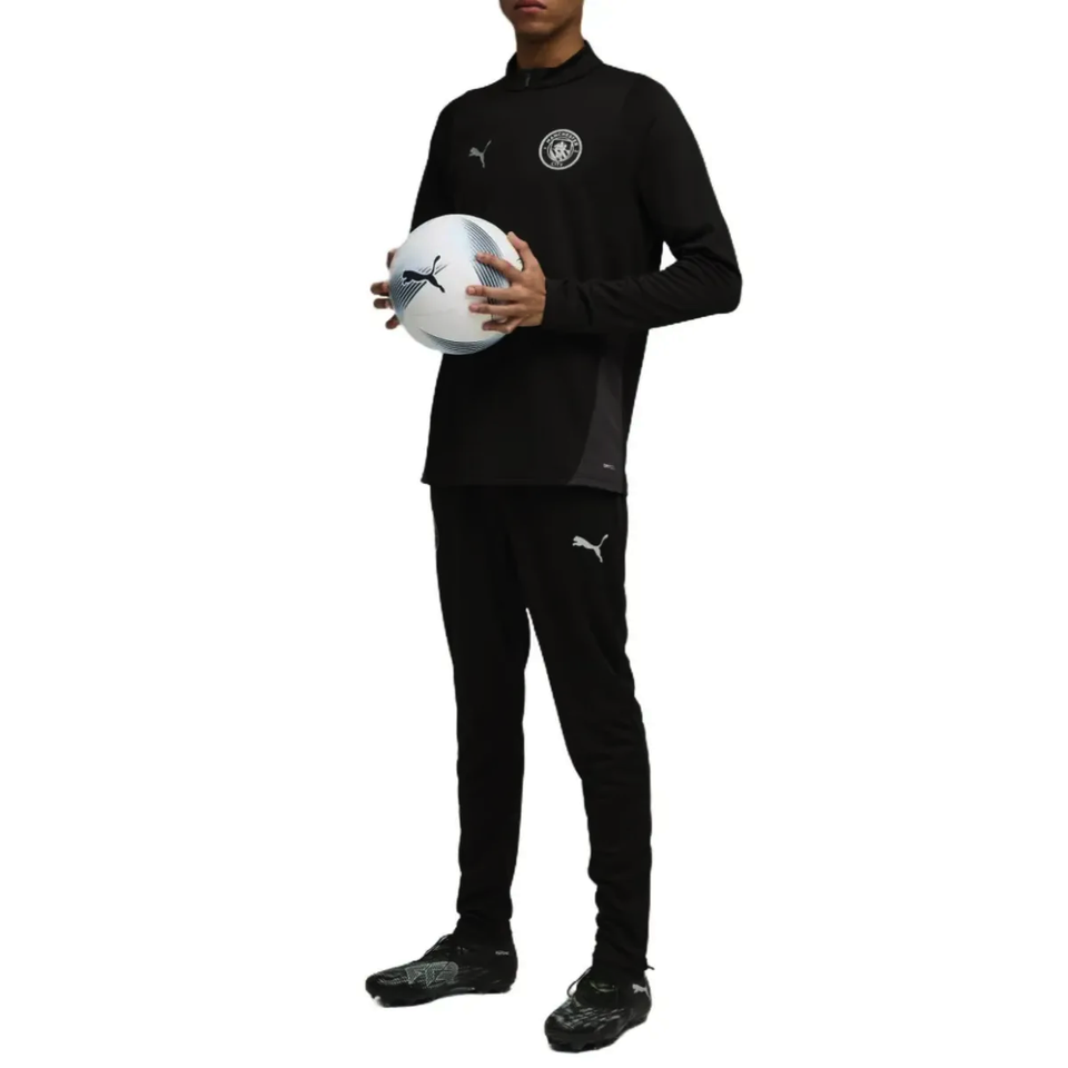 Manchester City black training tracksuit 2025 worn by a player on SoccerTracksuits.com