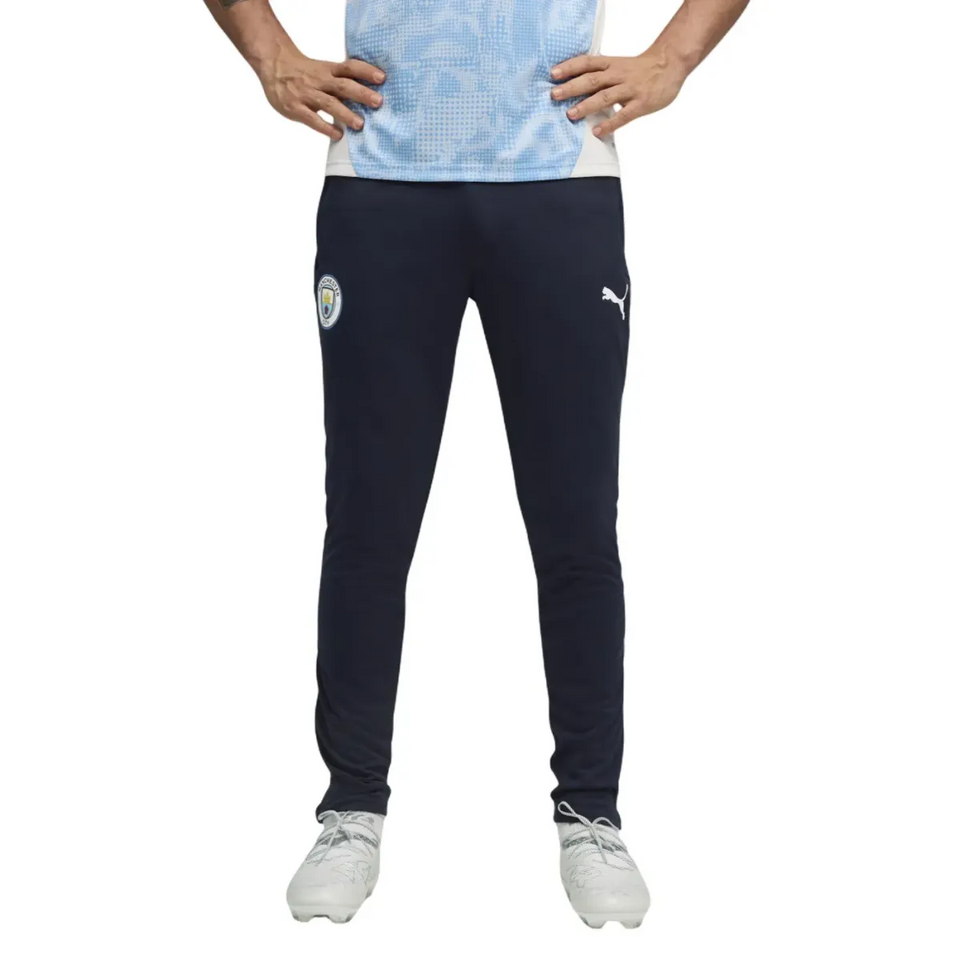 Manchester City training tracksuit 2025 26 featuring a lightweight top and comfortable jogger pants