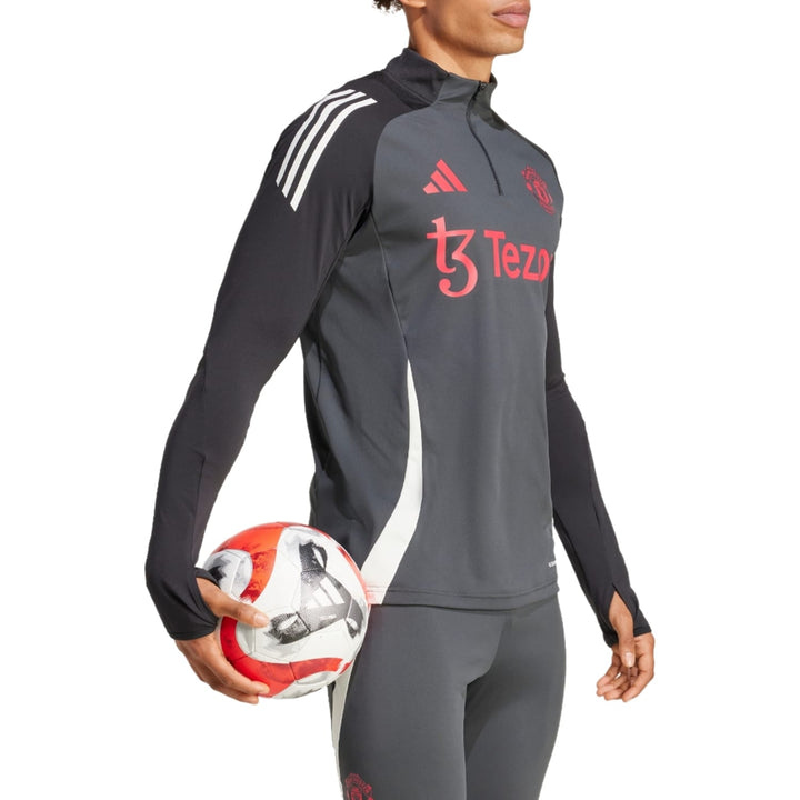 Manchester United training tracksuit 2024 25 featuring long sleeves and sleek design for athletes