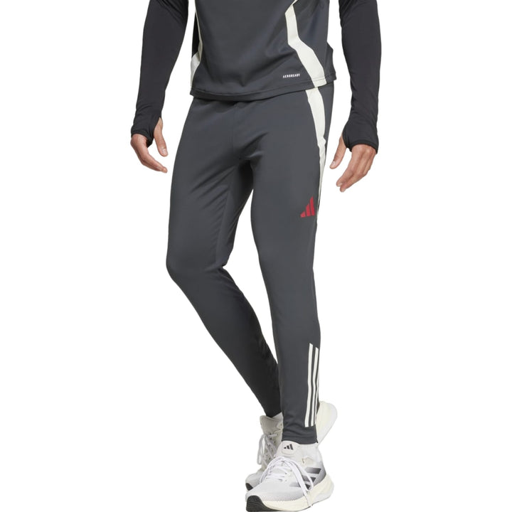 Manchester United training tracksuit 2024 25 featuring sleek design and fitted pants for optimal performance