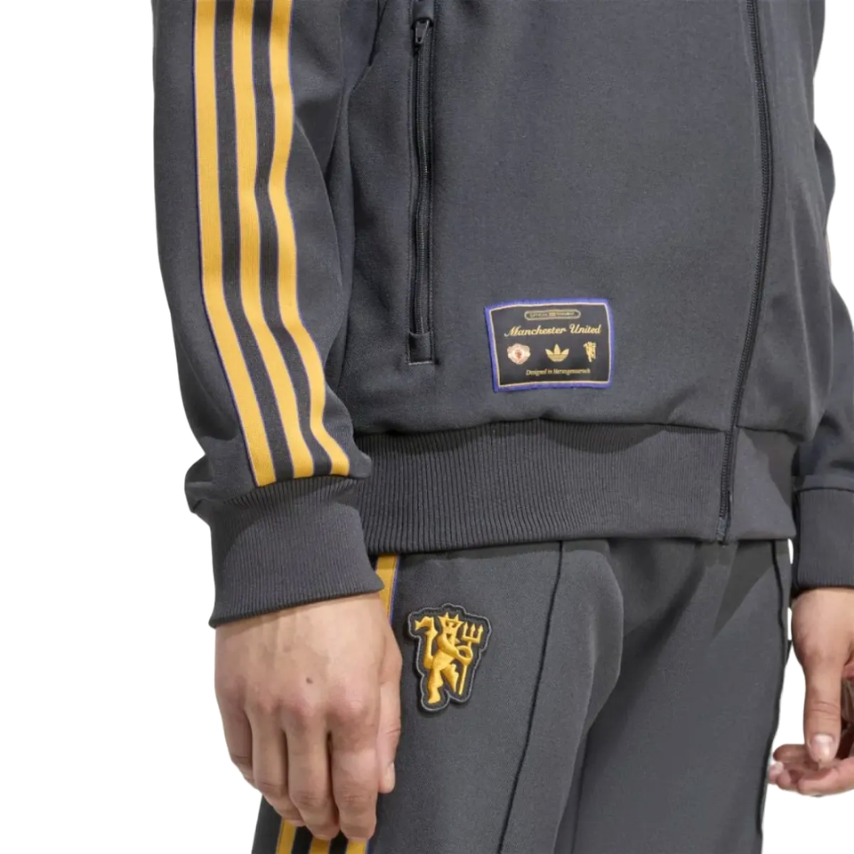 Manchester United Adidas Originals Tracksuit in Gray with Gold Stripes and Logo for Fans