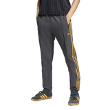 Manchester United Adidas Originals tracksuit pants featuring iconic three stripes and comfortable fit