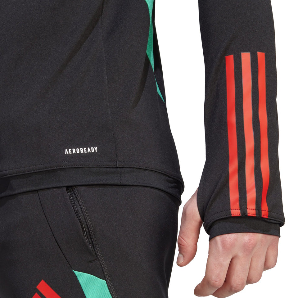 Close-up of Manchester United black training tracksuit 2023 showcasing AEROREADY fabric and detailed sleeve design