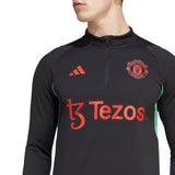 Manchester United black training tracksuit 2023 featuring a stylish design and Tezos logo