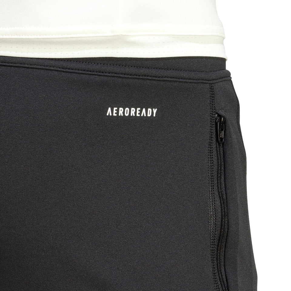 Close-up of the Manchester United black training tracksuit 2023 featuring Aeroready technology for comfort