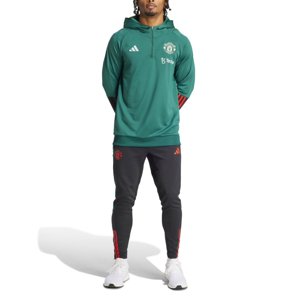 Manchester United hooded tracksuit 2024 in green with black pants and iconic team details
