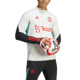Manchester United training tracksuit 2023 24 featuring Adidas design in white with black and red accents