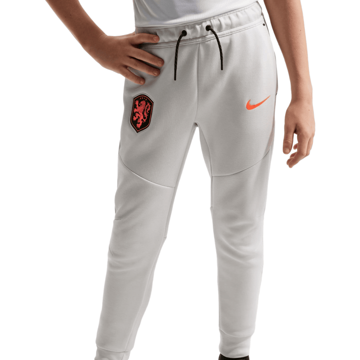 Light grey Nike Tech Fleece sweatpants with orange logo and Dutch national team crest