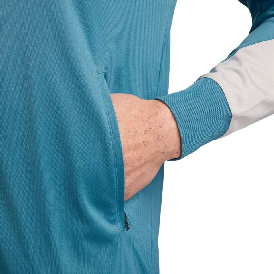 Close-up of hand in pocket on blue Atletico Madrid soccer tracksuit for sale from SoccerTracksuits.com