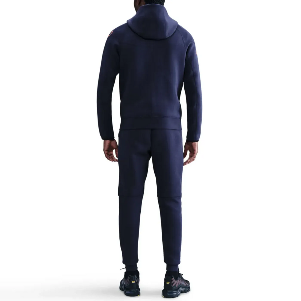 Back view of Nike Barcelona tech fleece tracksuit UCL in navy with a comfortable hood and fit