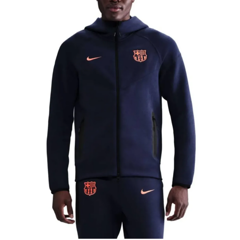 Nike Barcelona tech fleece tracksuit UCL in navy with the iconic club logo on SoccerTracksuits.com