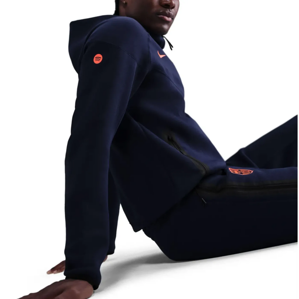 Nike Barcelona tech fleece tracksuit UCL in navy with logo details and sporty design on SoccerTracksuits.com