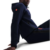 Nike Barcelona tech fleece tracksuit UCL in navy with logo details and sporty design on SoccerTracksuits.com