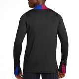 Back view of black Nike Barcelona training tracksuit top with blue and maroon accents on sleeves and collar