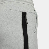 Close-up of grey Chelsea FC tech fleece tracksuit grey pants with black zippered pocket detail