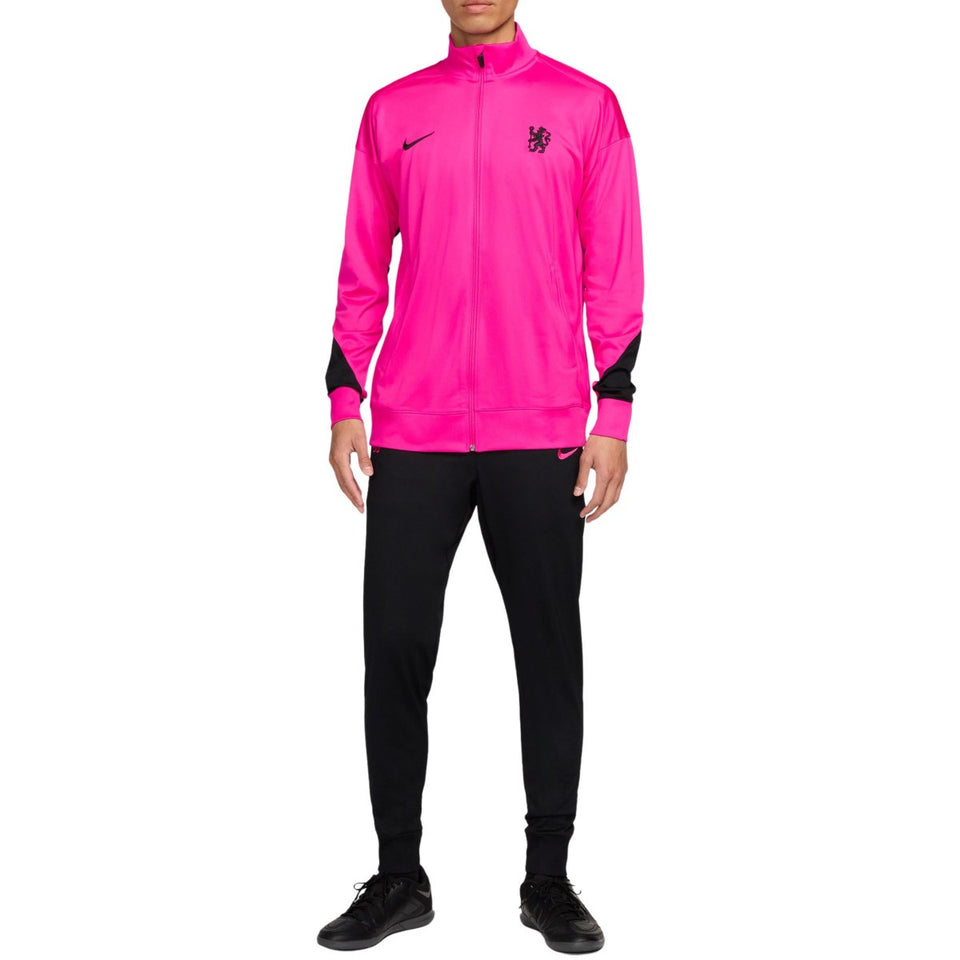 Nike Chelsea UCL presentation suit in bright pink jacket with black pants and black shoes