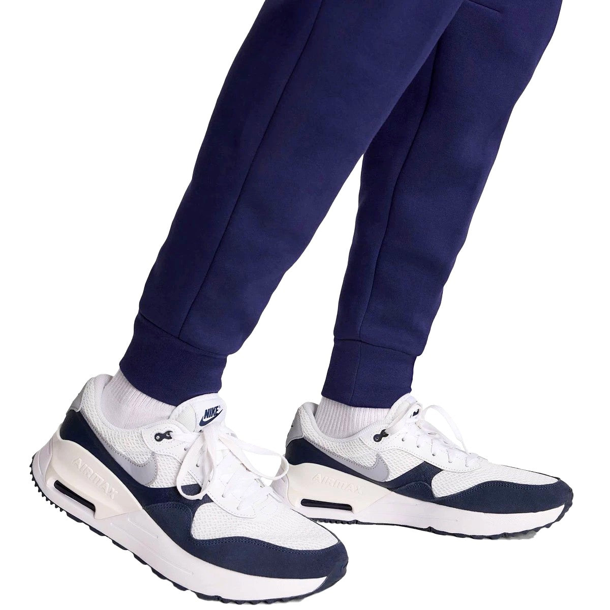 white and navy blue nike tech fleece