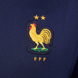 France soccer tracksuit 2024 featuring embroidered golden rooster emblem on navy fabric
