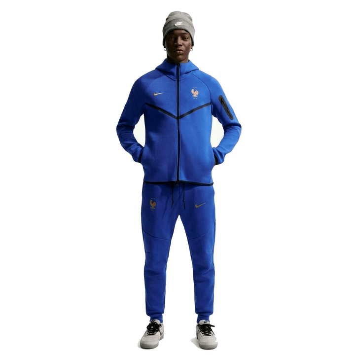 Nike France Tech Fleece 2026/27 presentation soccer tracksuit in blue with official team logo and matching pants set