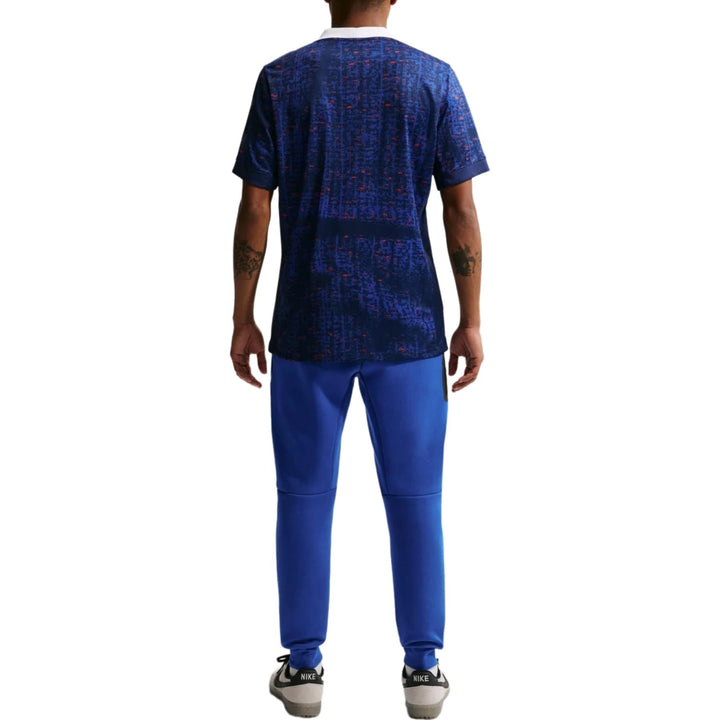 Nike France Tech Fleece presentation soccer tracksuit in blue with patterned top and matching pants for adults