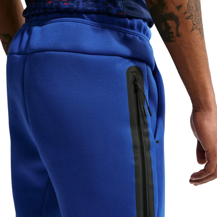 Nike France Tech Fleece presentation soccer tracksuit in blue with zippered pockets for adults