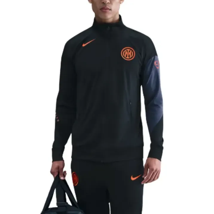 Inter Milan Nike UCL tracksuit 2025 26 in black with orange accents, designed for comfort and style