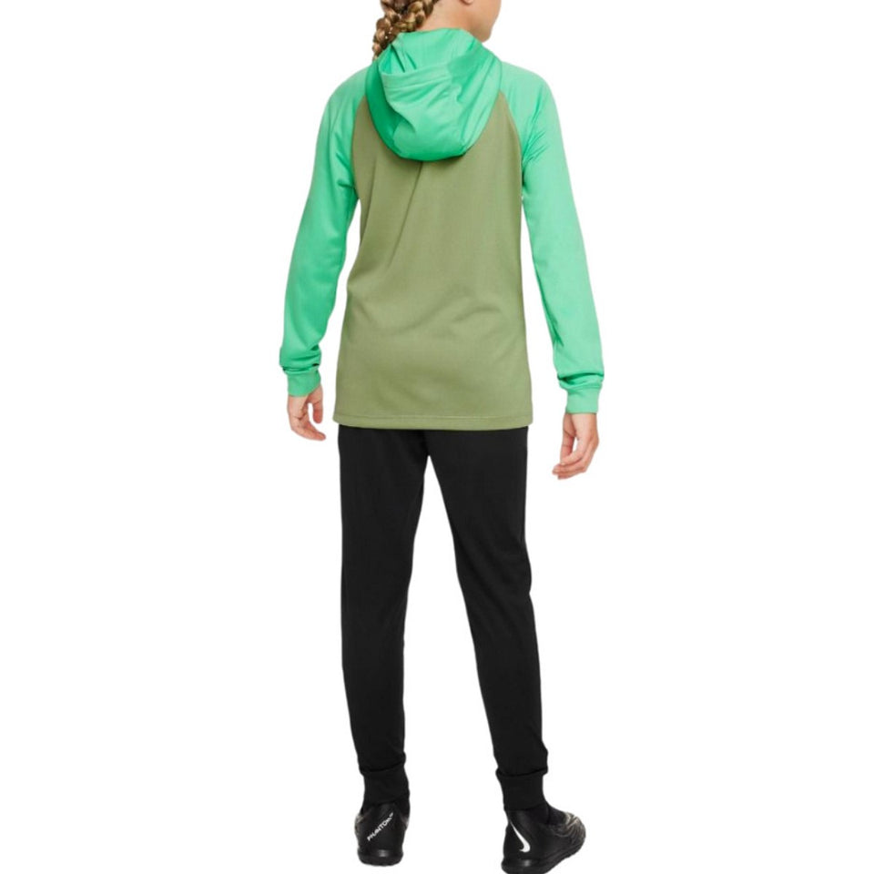 Back view of a kid wearing kids Atletico Madrid tracksuit with green hooded top and black pants