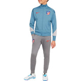 Kids Atletico Madrid tracksuit by Soccer Tracksuits in blue and gray with red logo accents