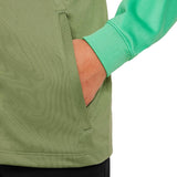 Close-up of hand in pocket of green and mint kids Atletico Madrid tracksuit jacket on SoccerTracksuits.com