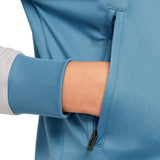 Close-up of hand in blue zippered pocket of kids Atletico Madrid tracksuit by Soccer Tracksuits