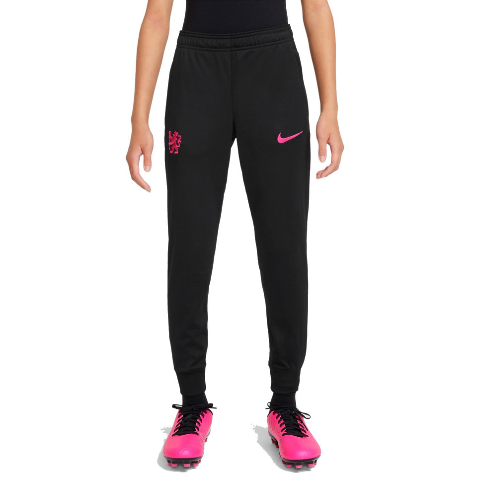 Kids Chelsea FC training tracksuit black pants with pink Nike logo and club crest on Soccer Tracksuits